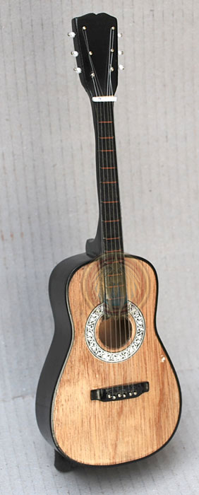 Natural wood color acoustic guitar