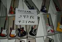 Proccess colecting miniature guitar befor packing