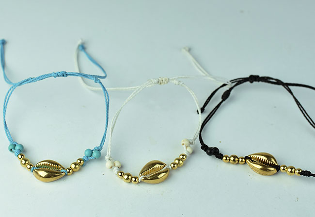 supply beautiful bracelet gold shell plate charms with braided cord made in Bali Indonesia