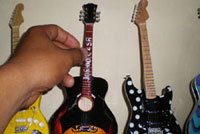 Production Guitar miniature in drying oven proccess