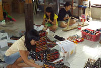 final quality control miniature music instrument products before packing and shipment