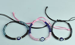 Bali mecrame brecalet with bead and resin round ornament cheap price
