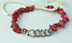 Bead breclet with strings and metal ornament made in Bali and cheap price