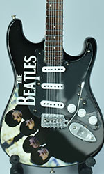 The Beatles Paul McCartney wooden miniature guitar